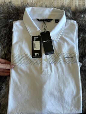 Travis Mathew White Polo with Subtle Yellow and Light Blue Stripe Accents